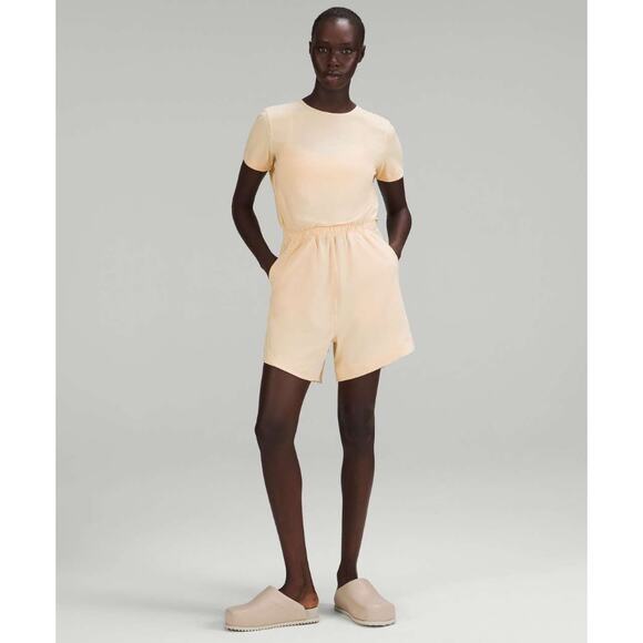 NWT Women's Lululemon Lightweight High-Neck Romper in Butter Yellow size 0 - Picture 1 of 5